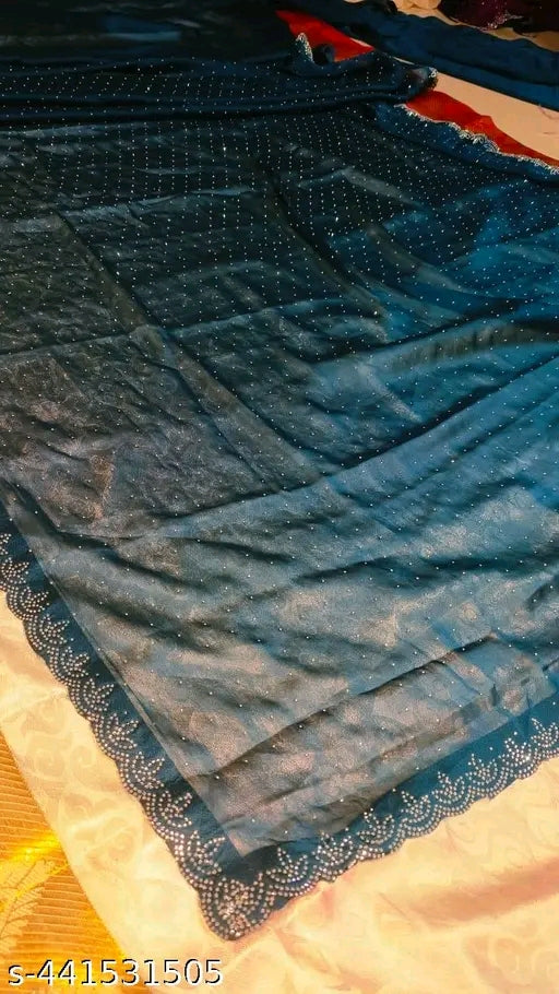 Beautiful chiffon saree with all over hot fix chiffon hot fix blouse leaves along with Swarovski work at border same as saree blouse